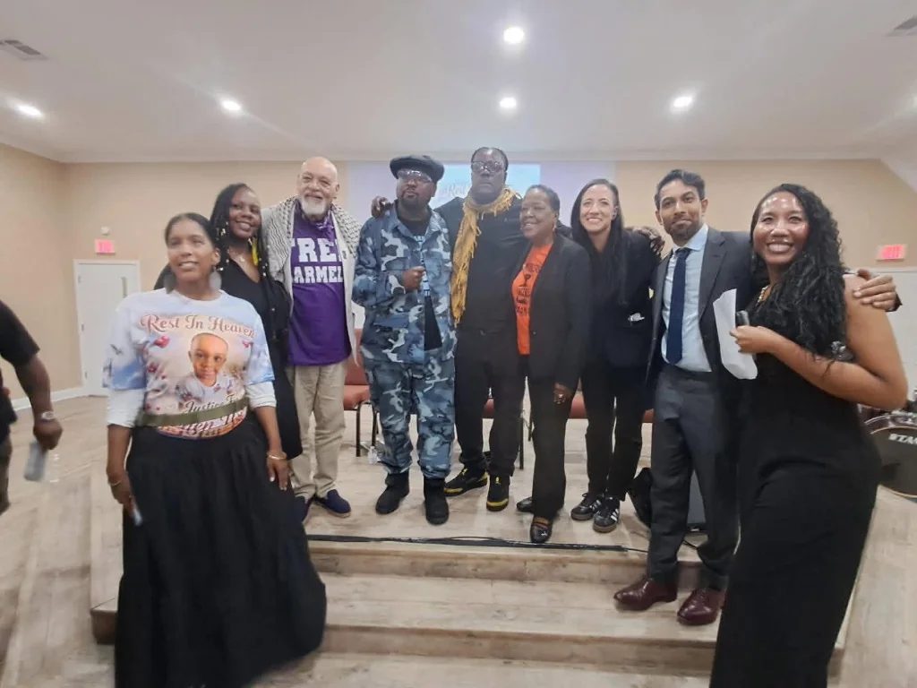 Community and legal supporters gathered in a sanctuary